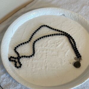 Black necklace with pendant